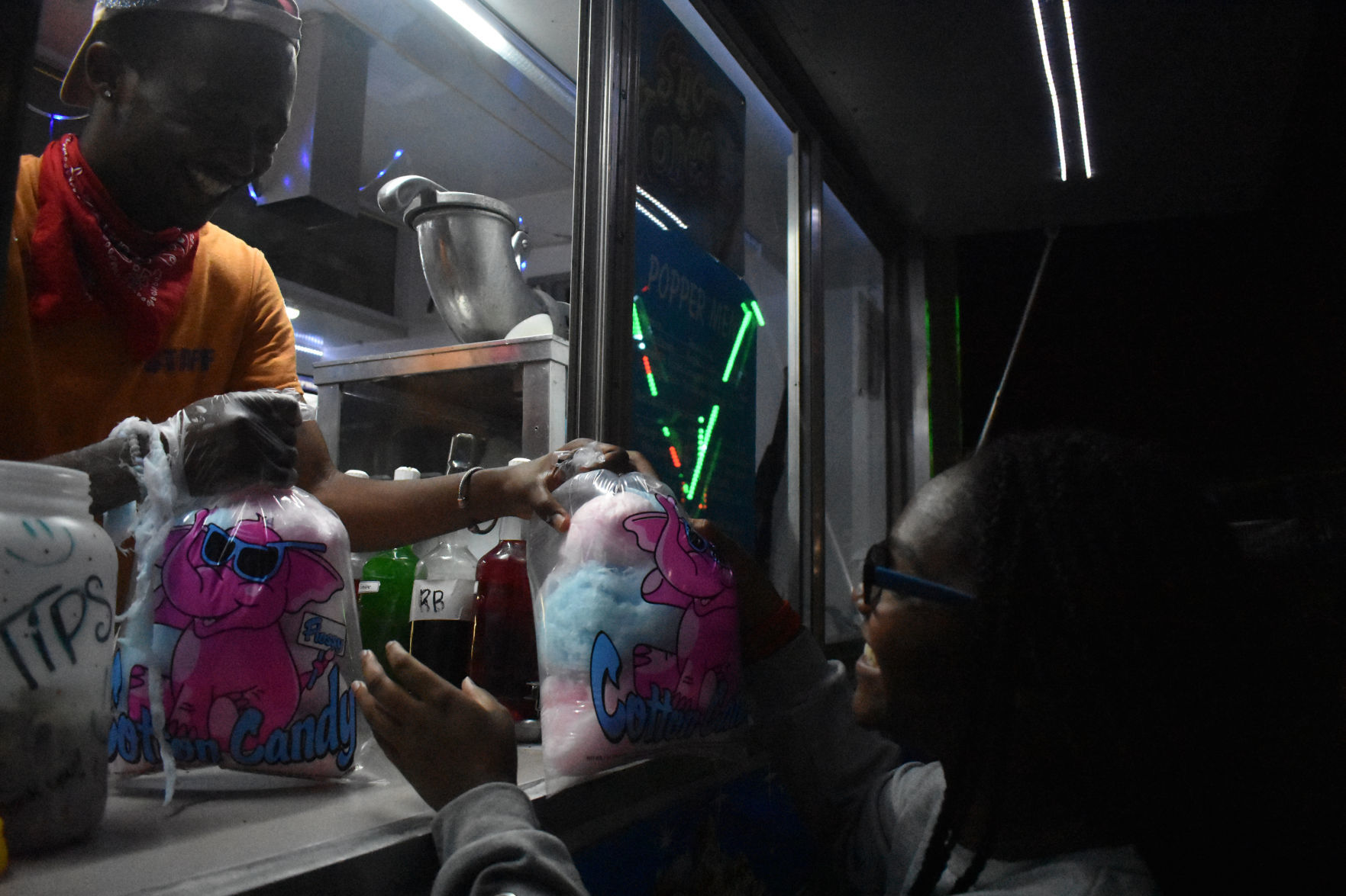 Serving cotton candy at the fair